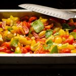 vegetable salad on gray tray